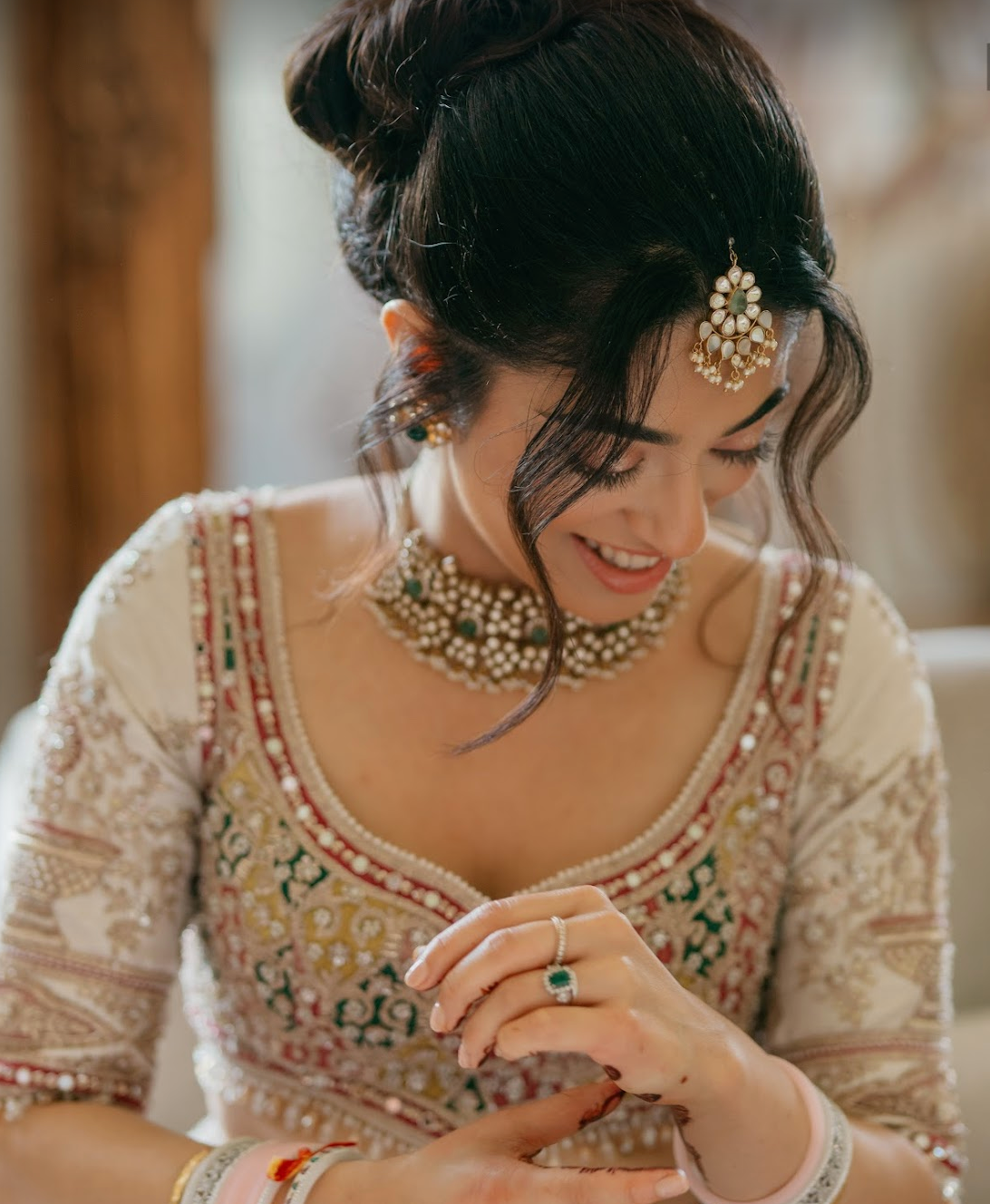 Indian bride with glowing skin after using MotherEarth's handmade organic skincare products
